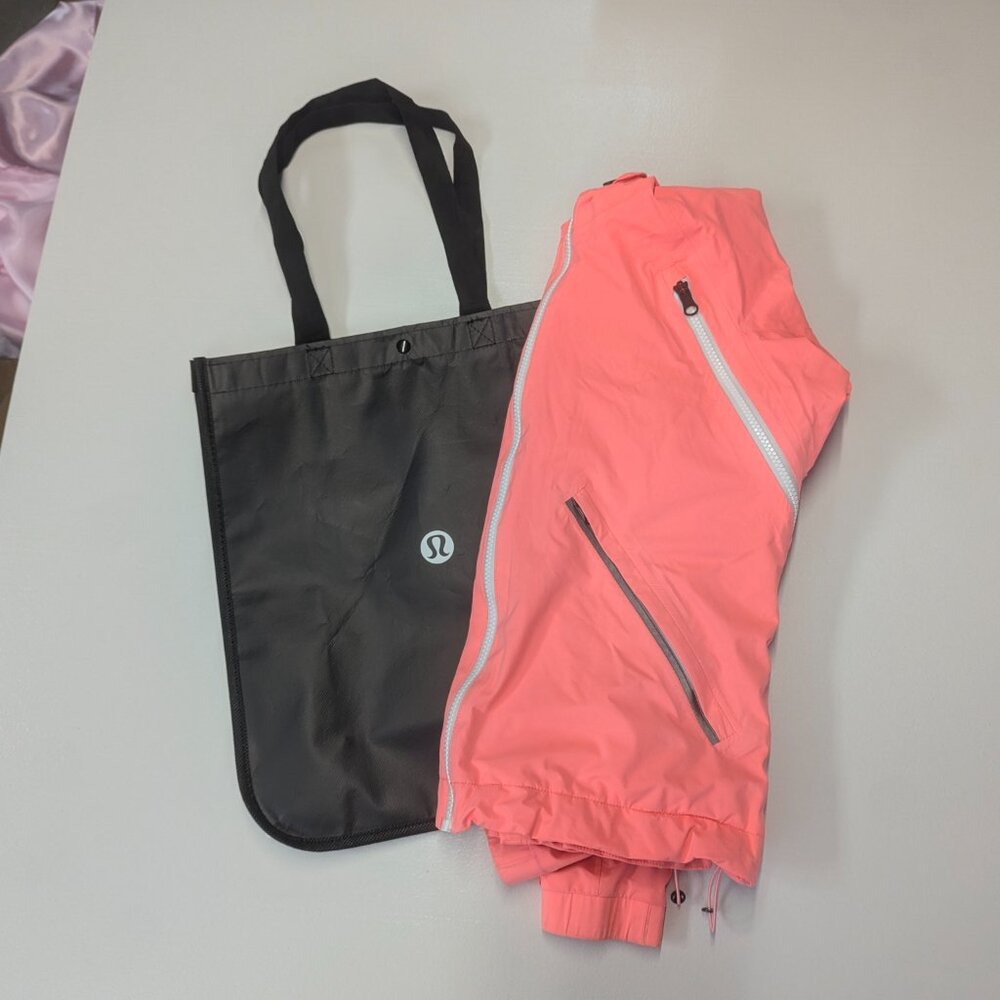 Lululemon Size 4  Rise And Shine Jacket in Pop Orange + Free Tote Bag